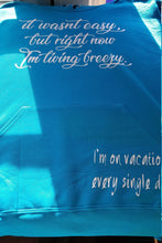 Load image into Gallery viewer, It wasnt easy but right now I'm living breezy, I'm on vaction every single day hoodie

