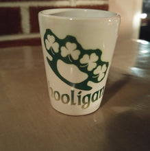 Load image into Gallery viewer, Hooligan brass knuckle shamrock shot glass
